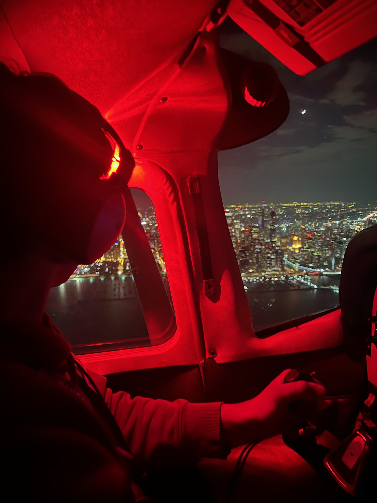 Flight Instructor in cockpit at night